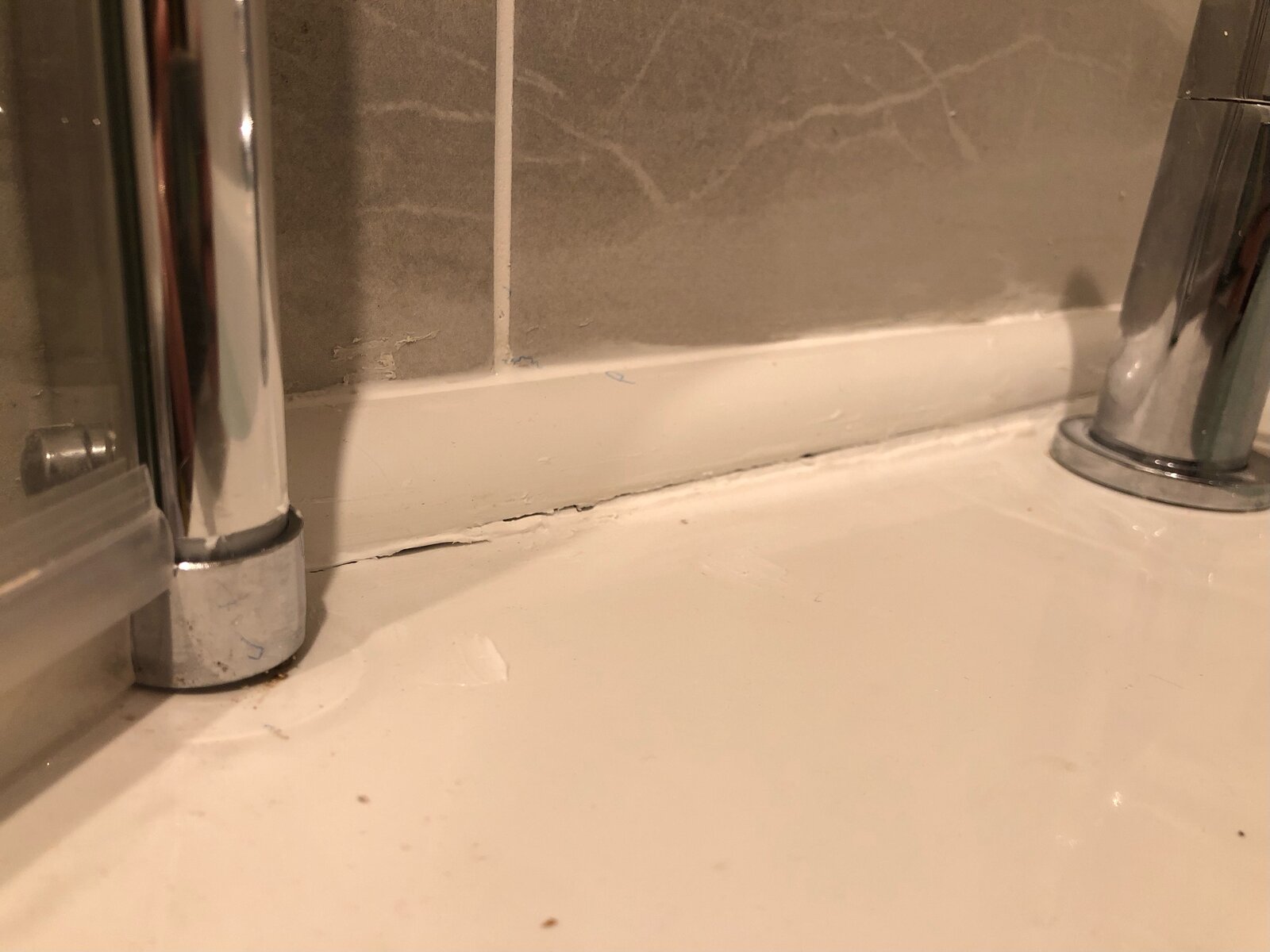 Sealant around taps (1).jpeg