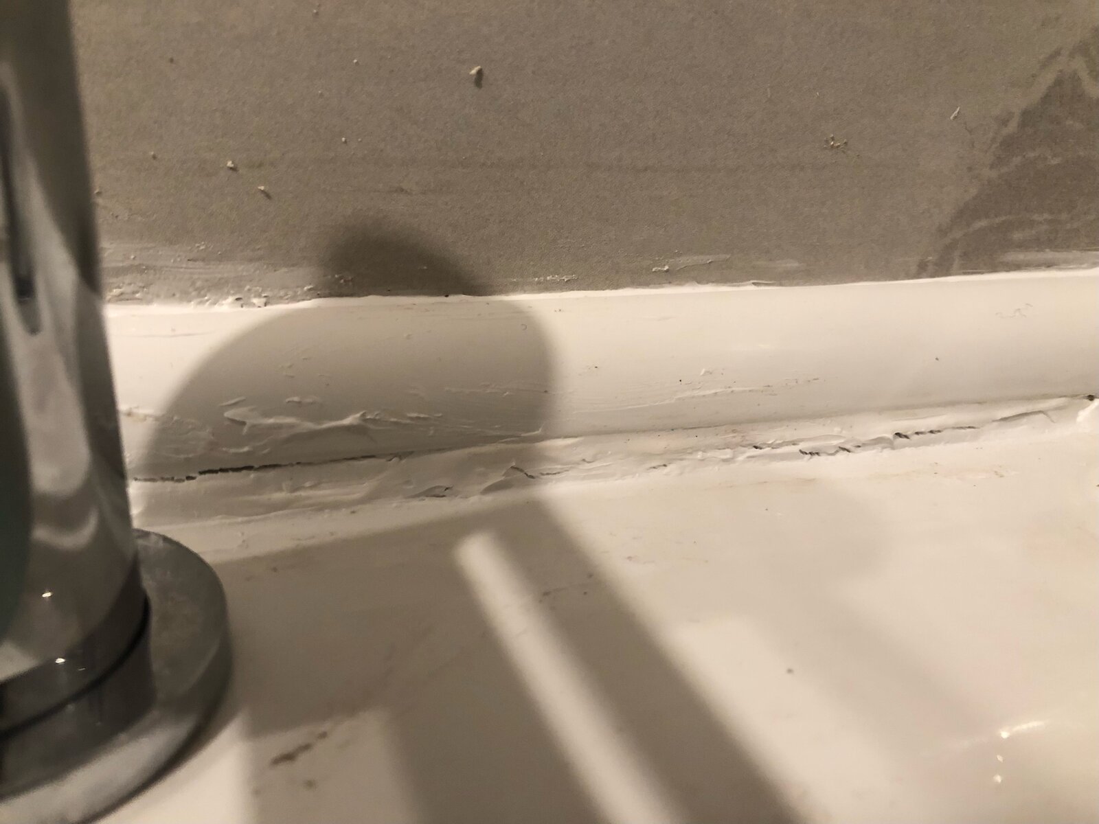 Sealant around taps (3).jpeg